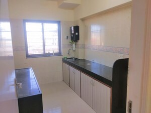 Kitchen in 2 BHK Apartment at K Raheja Palm Spring, Malad West – for Rent