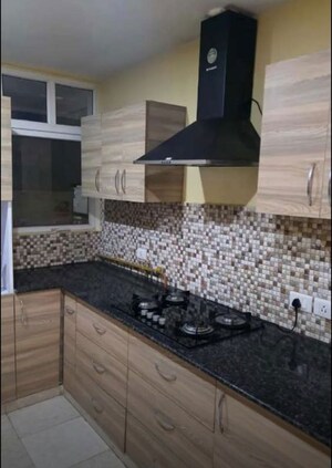 Kitchen in 4 BHK Apartment at Eldeco Elegante, Vibhuti Khand – for Rent