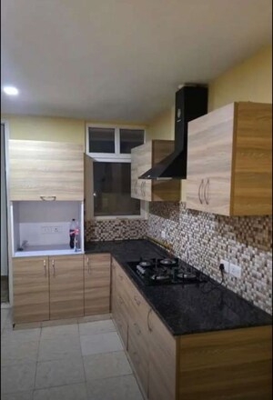 Kitchen in 4 BHK Apartment at Eldeco Elegante, Vibhuti Khand – for Rent