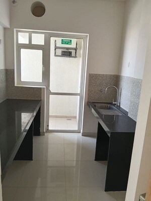 Kitchen in 2 BHK Apartment at Godrej Nurture Pune, Mamurdi – for Rent