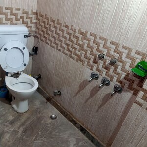 Bathroom in 1.5 BHK Builder Floor at Outram Lines – for Rent