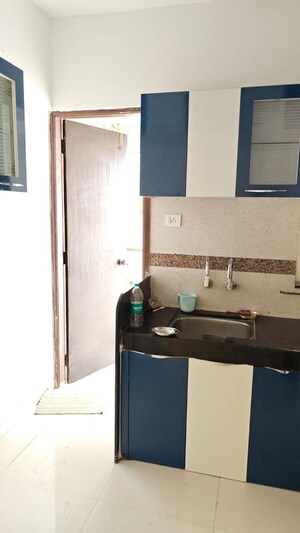 Kitchen in 3 BHK Apartment at Vijaylaxmi River Residency, Chikhali – for Rent