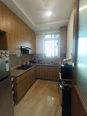 Kitchen in 2 BHK Apartment at Ambience Creacions, Sector 22 – for Rent