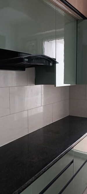 Kitchen in 2.5 BHK Apartment at Smart World Gems, Sector 89 – for Rent