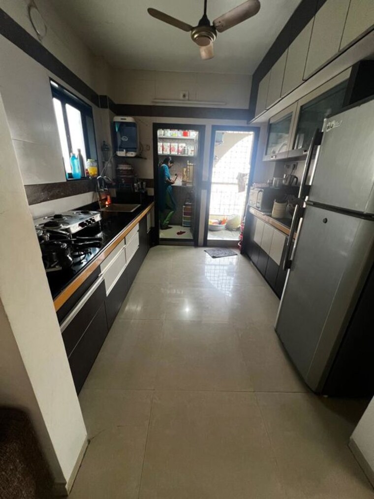 Kitchen, adajan 3 Bedroom 1200 Sq.Ft. Apartment In Adajan Surat 10121745