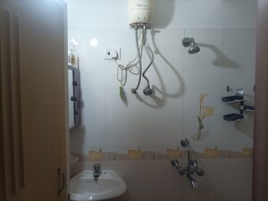 Bathroom in 2 BHK Apartment at Charms Residency CHS, Brahmand – for Rent