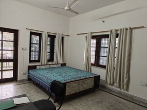 Bedroom in 2 BHK Apartment at Hansmukhi Garden Estate, Sahastradhara Road – for Rent