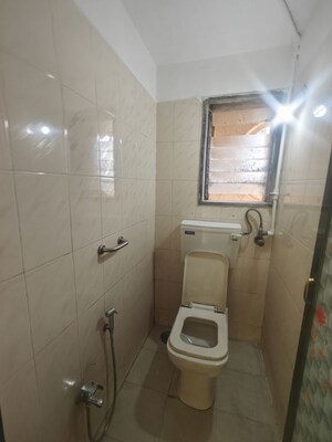 Bathroom in 1 BHK Apartment at Sai Sangh CHS, Nerul – for Rent