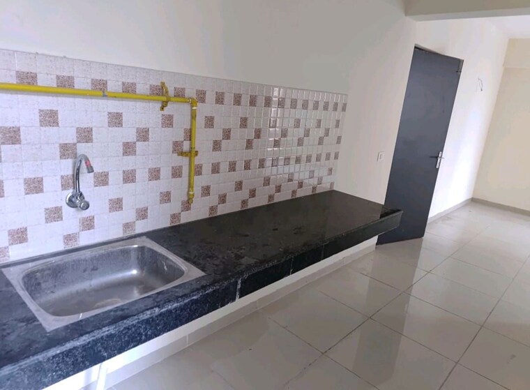 Kitchen, wave-dream-homes 2 Bedroom 840 Sq.Ft. Apartment In Wave City Ghaziabad 10166686