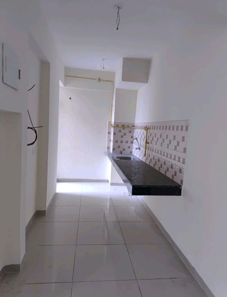 Kitchen, wave-dream-homes 2 Bedroom 840 Sq.Ft. Apartment In Wave City Ghaziabad 10166686