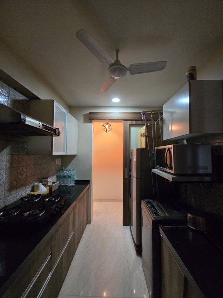 Kitchen, supreme-19 2 Bedroom 638 Sq.Ft. Apartment In Lokhandwala Mumbai 10166696