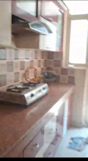Kitchen in 3 BHK Apartment at Uninav Heights Phase I, Raj Nagar Extension – for Rent