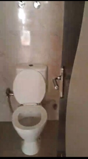 Bathroom in 3 BHK Apartment at Uninav Heights Phase I, Raj Nagar Extension – for Rent