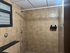 Bathroom in 3 BHK Apartment at Puravankara Purva Atmosphere, Thanisandra Main Road – for Rent