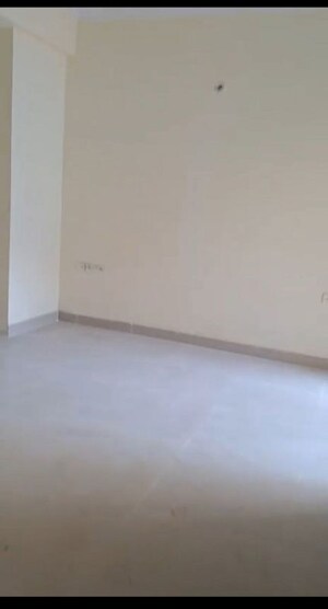 Room in 2.5 BHK Apartment at Charms Castle, Raj Nagar Extension – for Rent