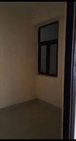 Room in 2.5 BHK Apartment at Charms Castle, Raj Nagar Extension – for Rent