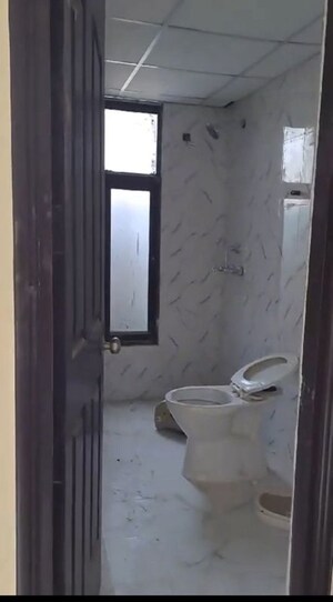 Bathroom in 2.5 BHK Apartment at Charms Castle, Raj Nagar Extension – for Rent