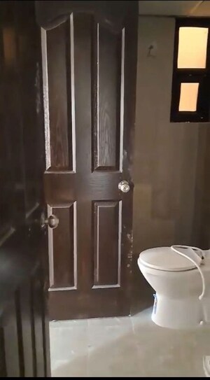 Bathroom in 2.5 BHK Apartment at Charms Castle, Raj Nagar Extension – for Rent