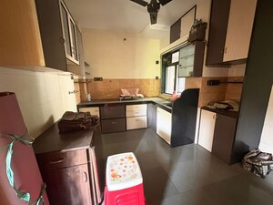 Kitchen in 2 BHK Apartment at Adarsh CHS Vasant Vihar, Vasant Vihar – for Rent