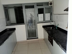 Kitchen in 1 BHK Apartment at Amanora Future Towers, Hadapsar – for Rent