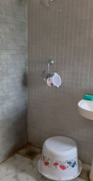 Bathroom in 2 BHK Apartment at Amrapali Centurian Park Phase II, Tech Zone 4 Greater Noida – for Rent