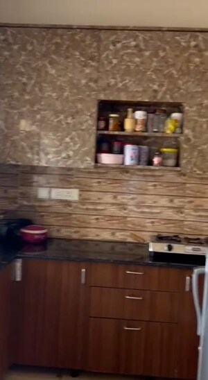 Kitchen in 2 BHK Apartment at Amrapali Centurian Park Phase II, Tech Zone 4 Greater Noida – for Rent
