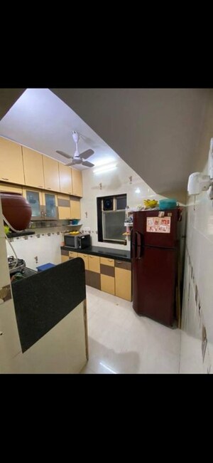 Kitchen in 1 BHK Apartment at Bhanumati CHS, Goregaon West – for Rent