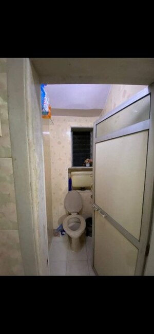 Bathroom in 1 BHK Apartment at Bhanumati CHS, Goregaon West – for Rent