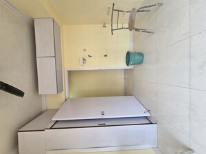 Bathroom in 2 BHK Apartment at Royal Palms, Goregaon East – for Rent