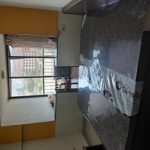 Living Room in 1 BHK Apartment at Satellite Garden, Goregaon East – for Rent