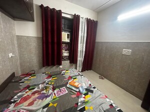 Bedroom in 2 BHK Builder Floor at Dhakoli – for Rent