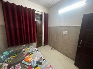 Bedroom in 2 BHK Builder Floor at Dhakoli – for Rent