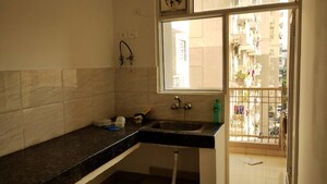 Kitchen in 3 BHK Apartment at Ajnara Homes, Sector 16b Greater Noida – for Rent