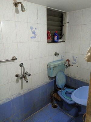 Bathroom in 2 BHK Apartment at Sawan Elegance, Kopar Khairane – for Sale