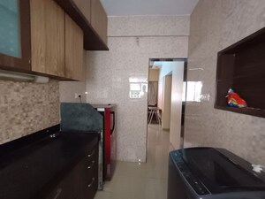 Kitchen in 2 BHK Apartment at Vashi Sector 12 – for Sale