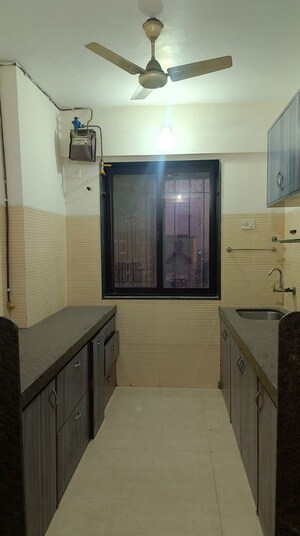 Kitchen in 3 BHK Apartment at Dosti Blossom, Wadala East – for Rent