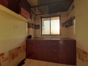 Kitchen in 1 BHK Apartment at Royal Palms Garden View, Goregaon East – for Rent