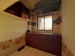 Kitchen in 1 BHK Apartment at Royal Palms Garden View, Goregaon East – for Rent