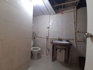 Master Bedroom in 1 BHK Apartment at Royal Palms Garden View, Goregaon East – for Rent