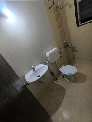 Bathroom in 2 BHK Apartment at Sai Mangal, Wagholi – for Rent