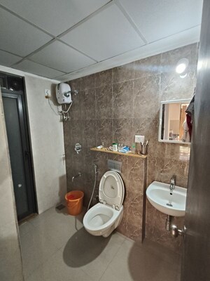 Bathroom in 1 BHK Apartment at Lodha Downtown, Dombivli East – for Rent