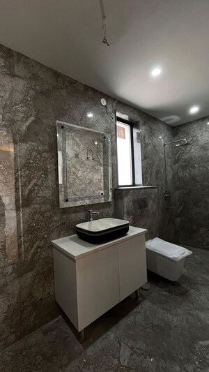 Bathroom in 4 BHK Apartment at Ansal API Versalia, Sector 67a – for Rent