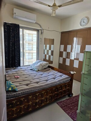 Bedroom in 2 BHK Apartment at Cosmos Lounge, Manpada – for Rent