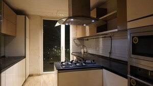 Kitchen in 5 BHK Apartment at Mahagun Marvella, Sector 78 – for Rent