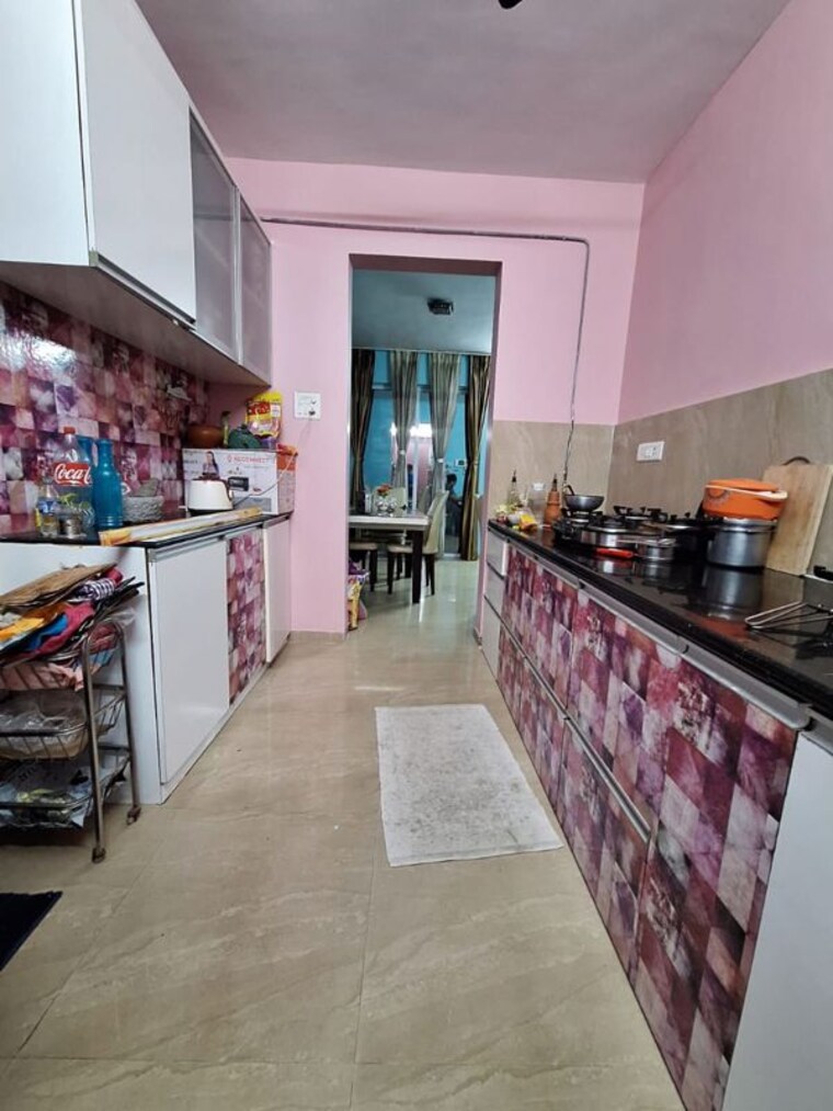 Kitchen, royal-orange-county 2 Bedroom 1060 Sq.Ft. Apartment In Rahatani Pune 10167354