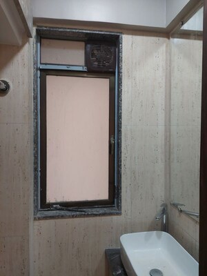 Building Lobby in 2 BHK Apartment at Lotus Unity, Versova – for Rent