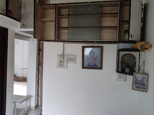 Kitchen in 1.5 BHK Apartment at Alkapuri Society – for Sale