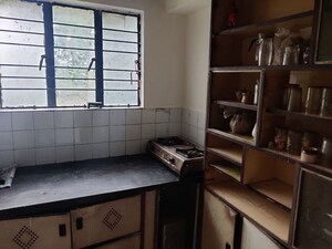 Kitchen in 1.5 BHK Apartment at Alkapuri Society – for Sale