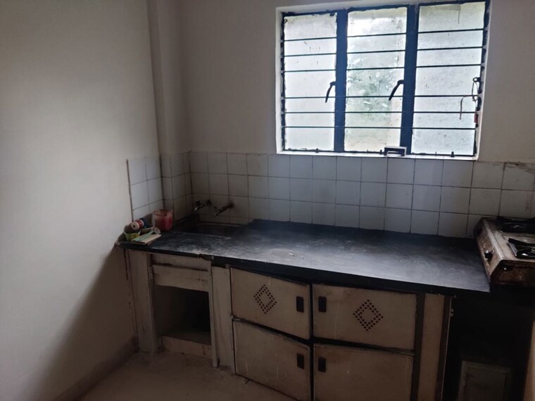 Kitchen, alkapuri society 1.5 Bedroom 680 Sq.Ft. Apartment In Alkapuri Society Pune 10167399
