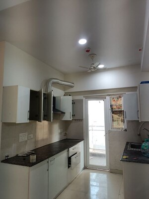 Kitchen in 3 BHK Apartment at Samridhi Luxuriya Avenue, Sector 150 – for Rent